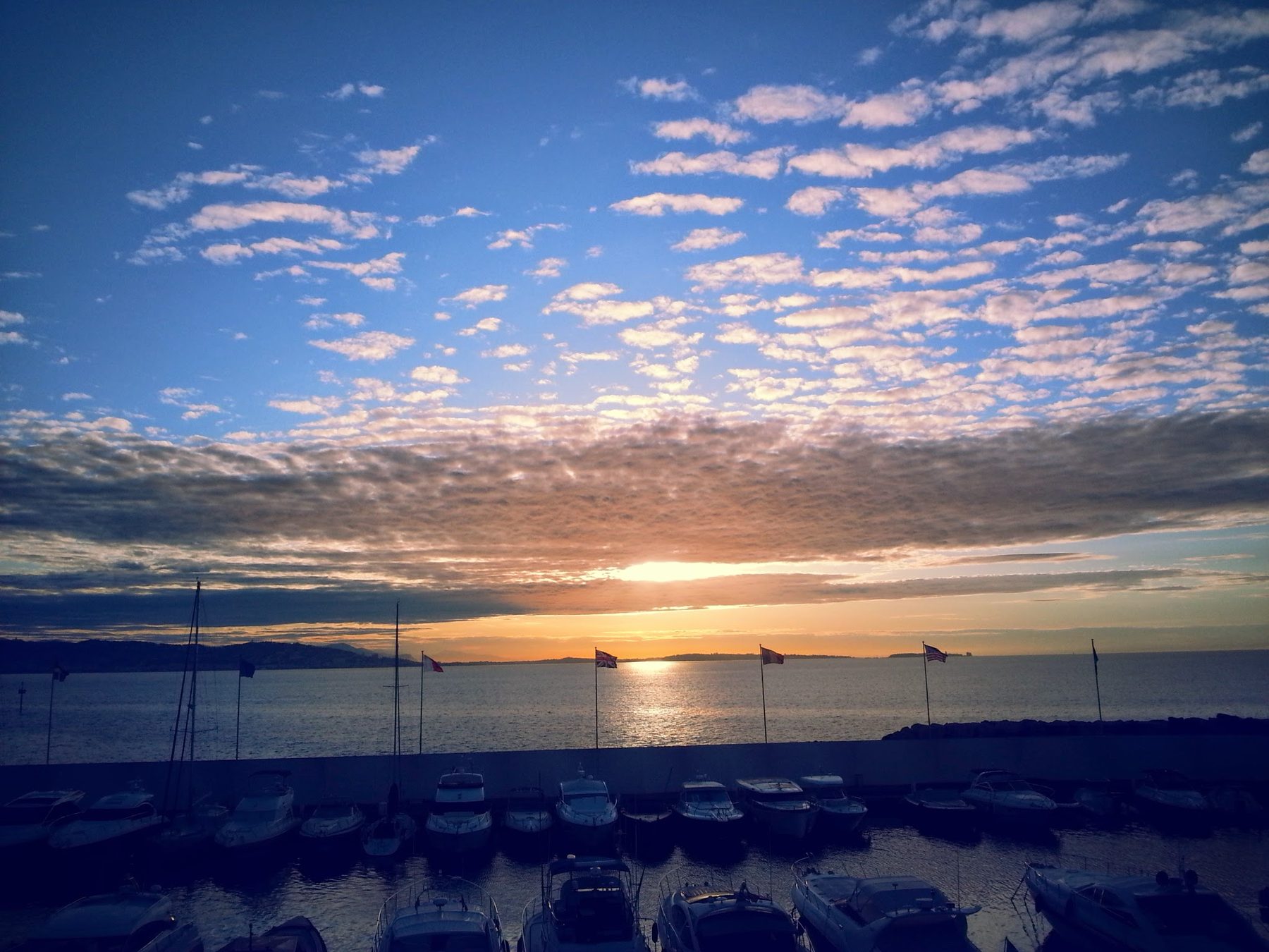 Sunrise over the Bay of Cannes from Port La Galère