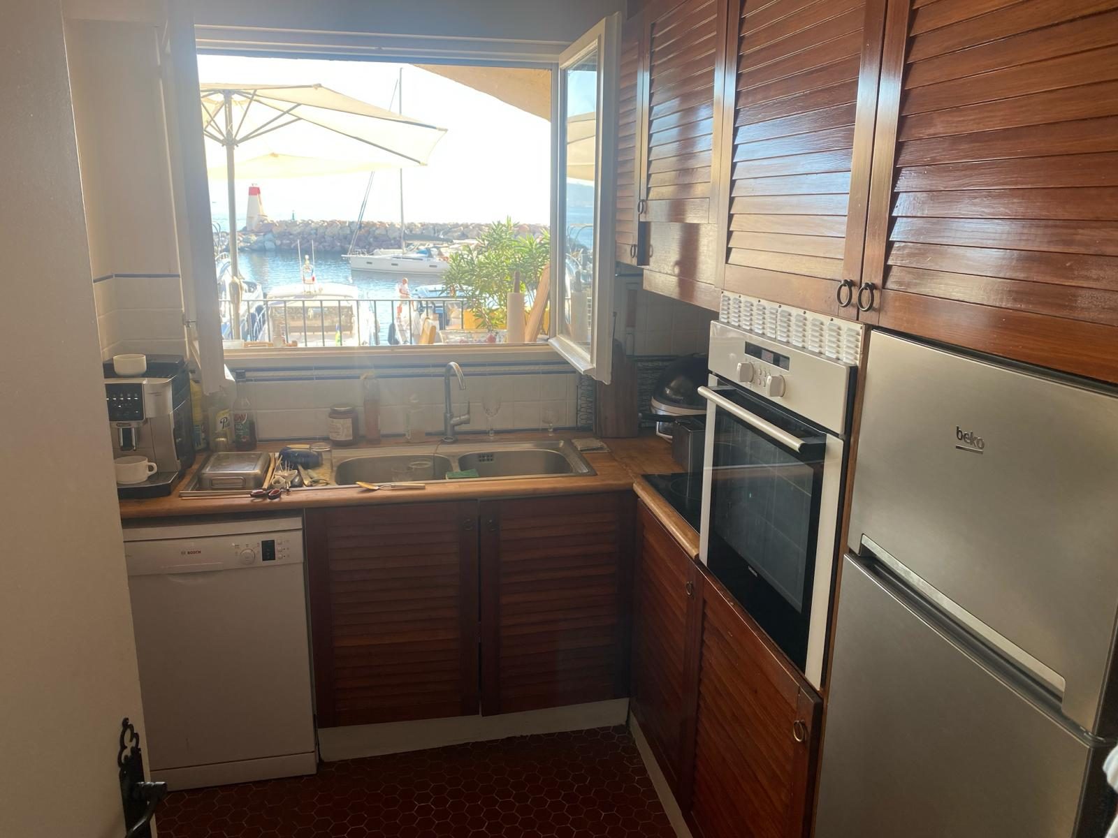 Kitchen window over the Port La Galère marina