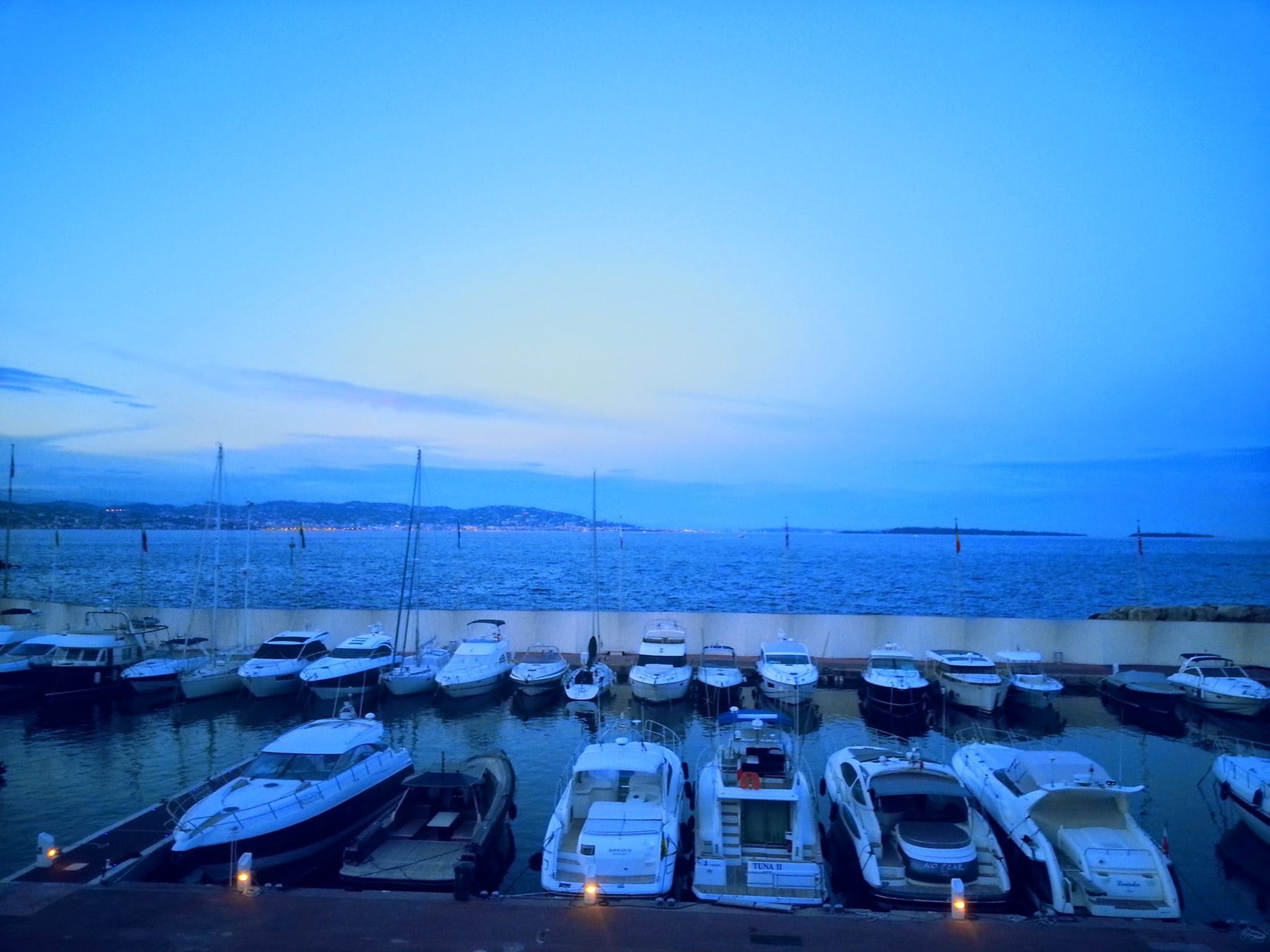 Dusk over the Port La Galère marina looking toward the Bay of Cannes